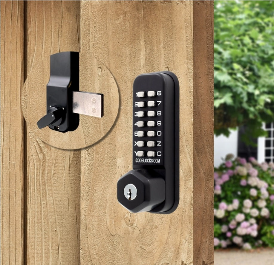 CodeLocks CL200 mechanical keypad surface deadbolt with key override on a wood gate