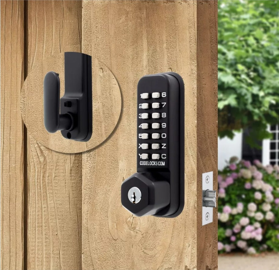 CodeLocks CL255 black marine keypad latch with key override on a wood gate